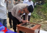 Kapolres Langkat Meresmikan Jembatan Merah Putih Dusun Sumber Waras – Batang Serangan